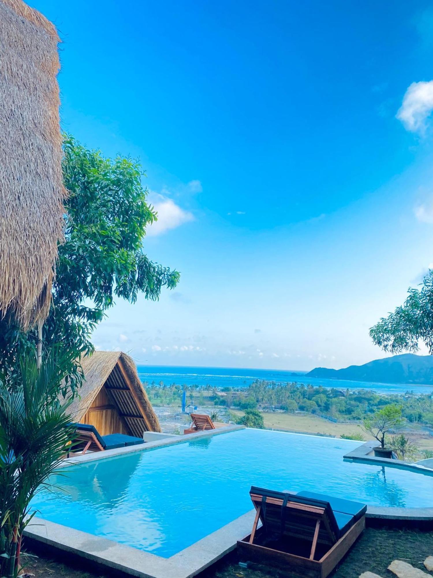 Sky Mountain Views Hotel Kuta  Bagian luar foto